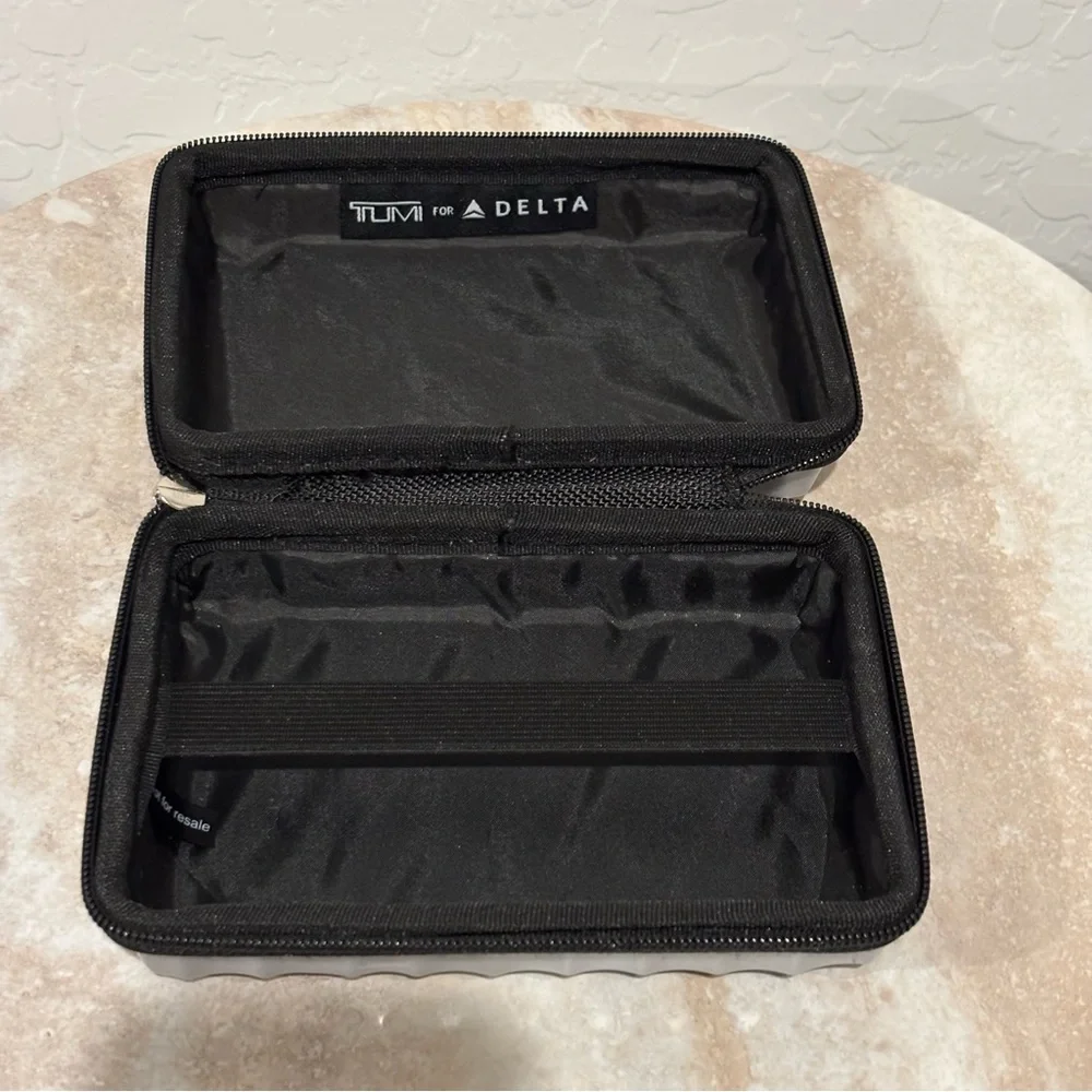 Tumi hard suitcase style cosmetic case